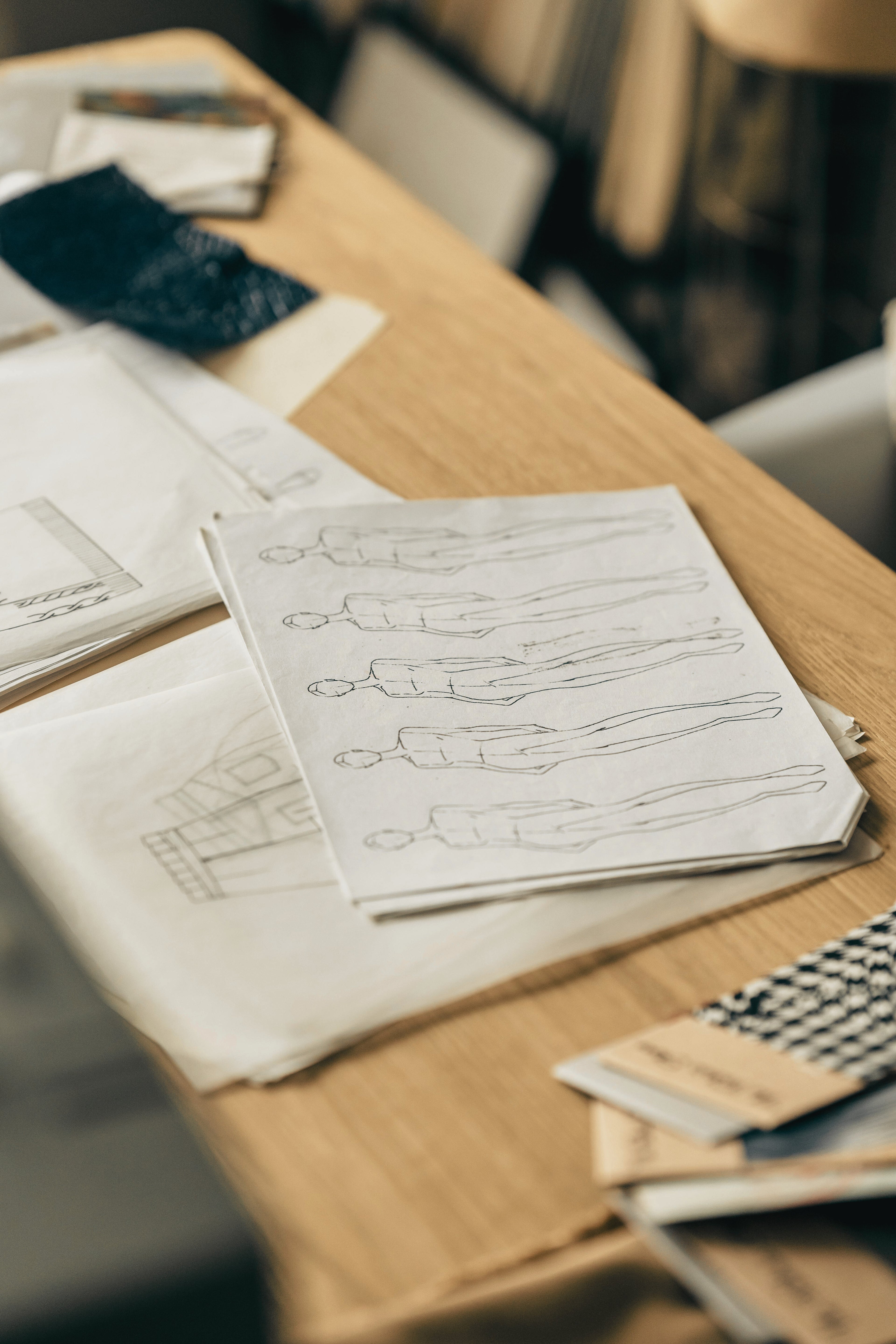 Designer sketches on desk